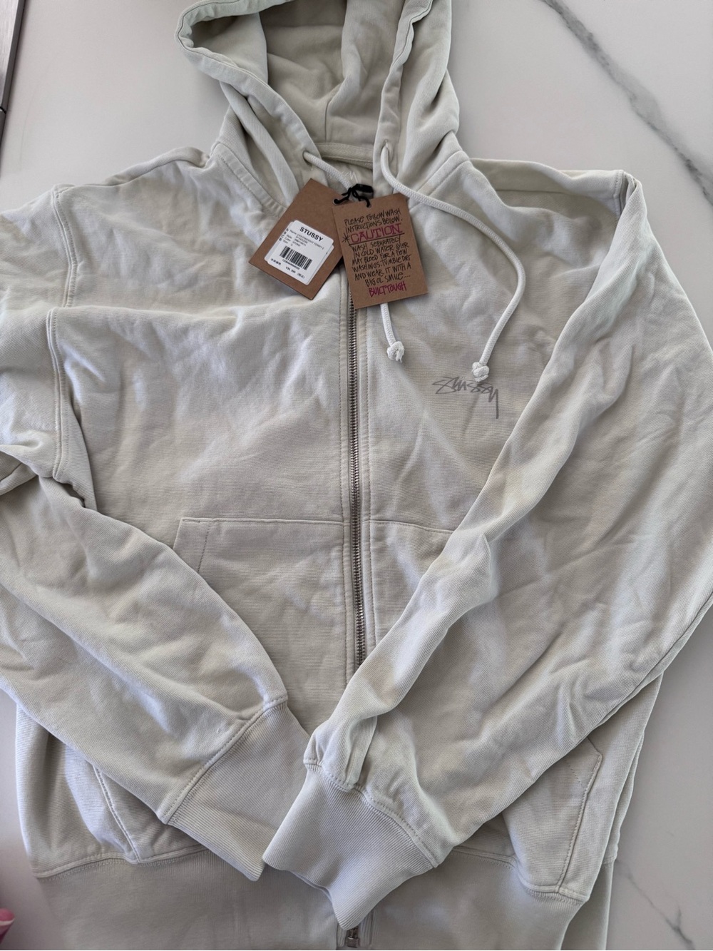 Stussy Cream Zip-Up Hoodie with Subtle Logo